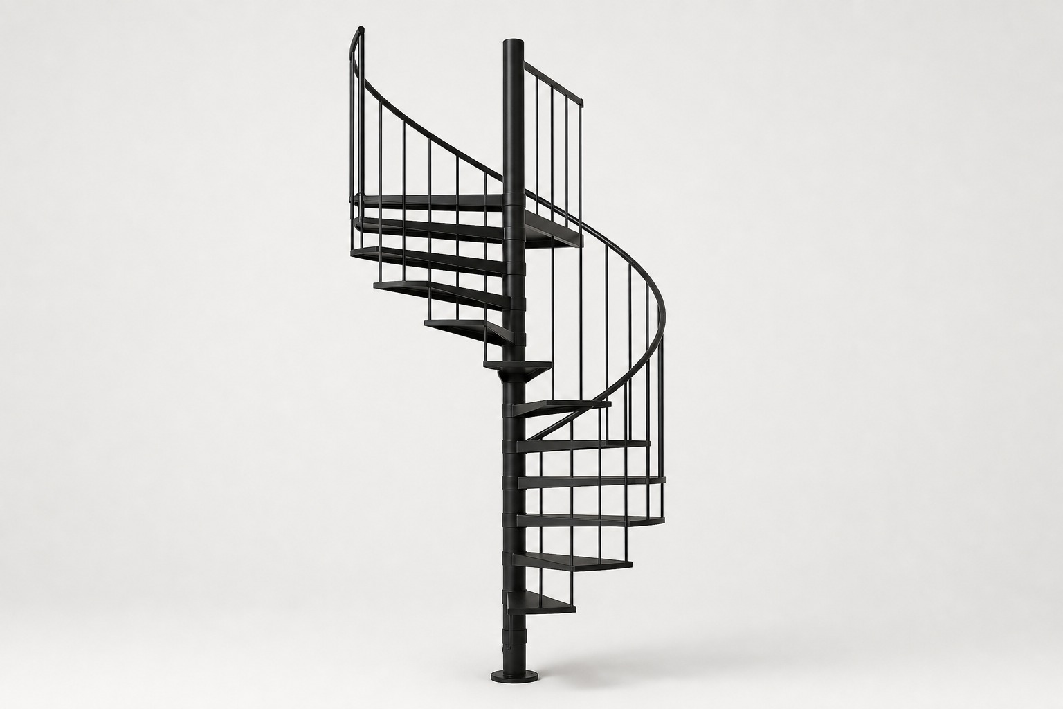 Black metal spiral staircase with open treads and vertical rod railing.
